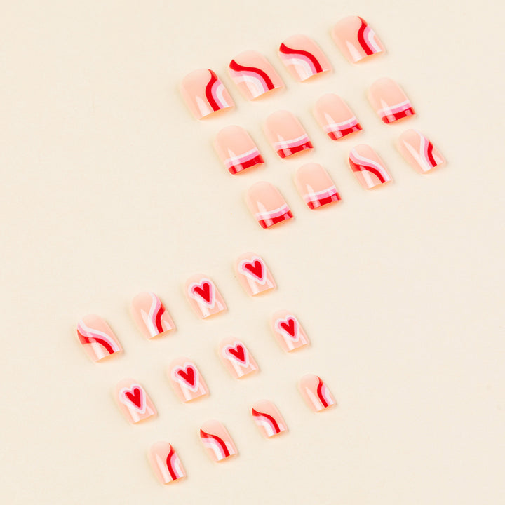 Artistic Heart-Themed Nail Art Extensions