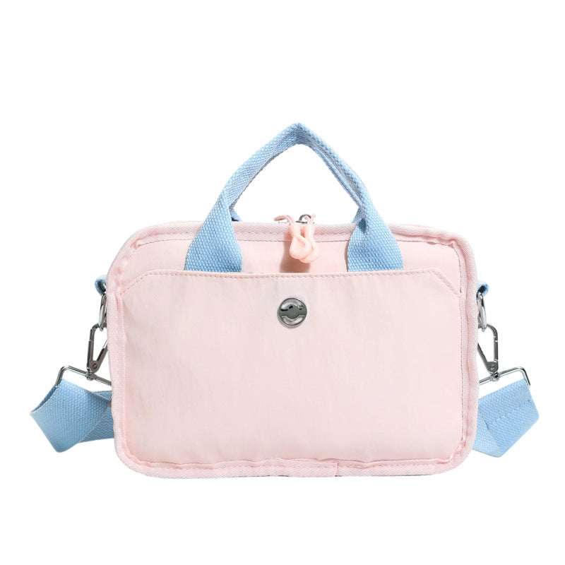 Tote bag with adjustable shoulder strap and extra storage Bowlift
