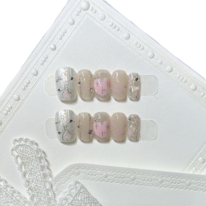 Decorative Press-On Nail Set with Heart and Silver Accents Bowlift