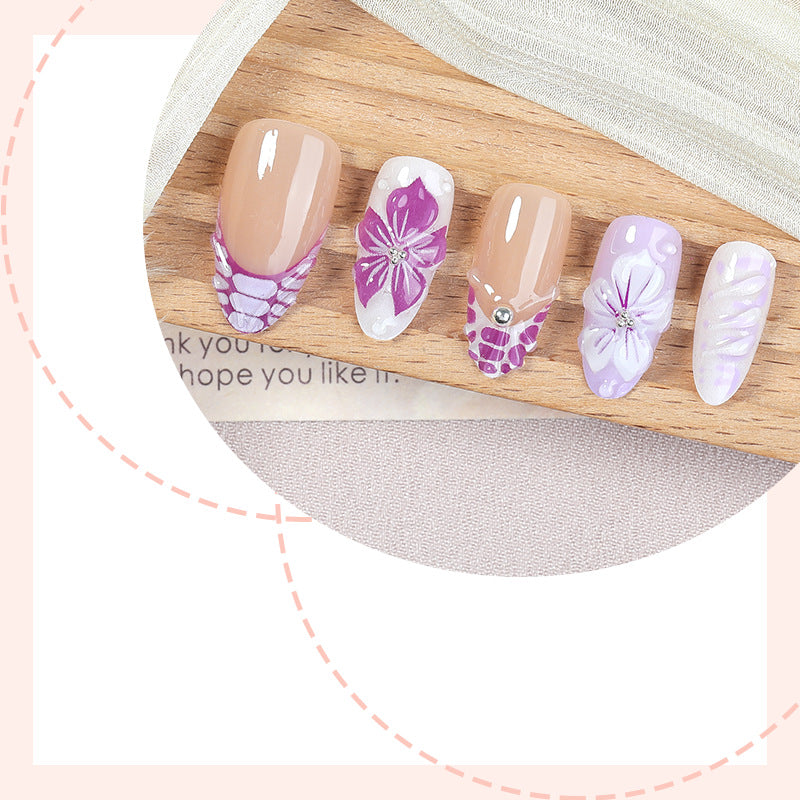 Artificial nail set with elegant flower designs and glitter accents Bowlift