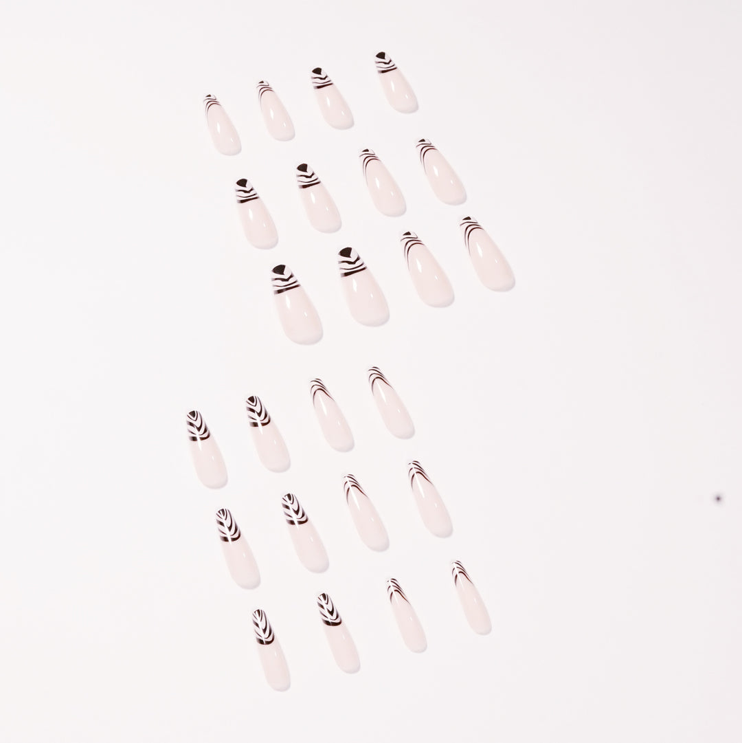 Artful Nail Extensions with Elegant Black-White Pattern Bowlift