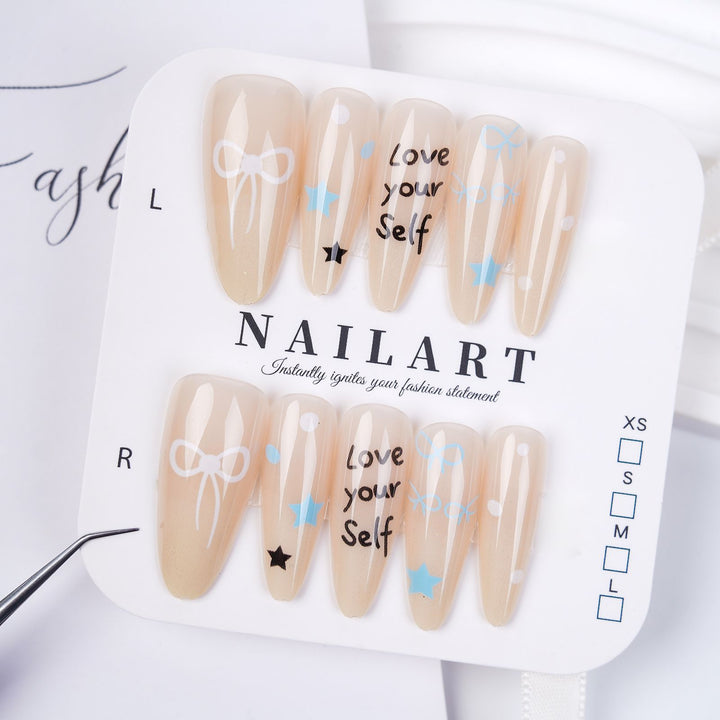 Elegant Stiletto Press-On Nails with Decorative Floral Accents Bowlift