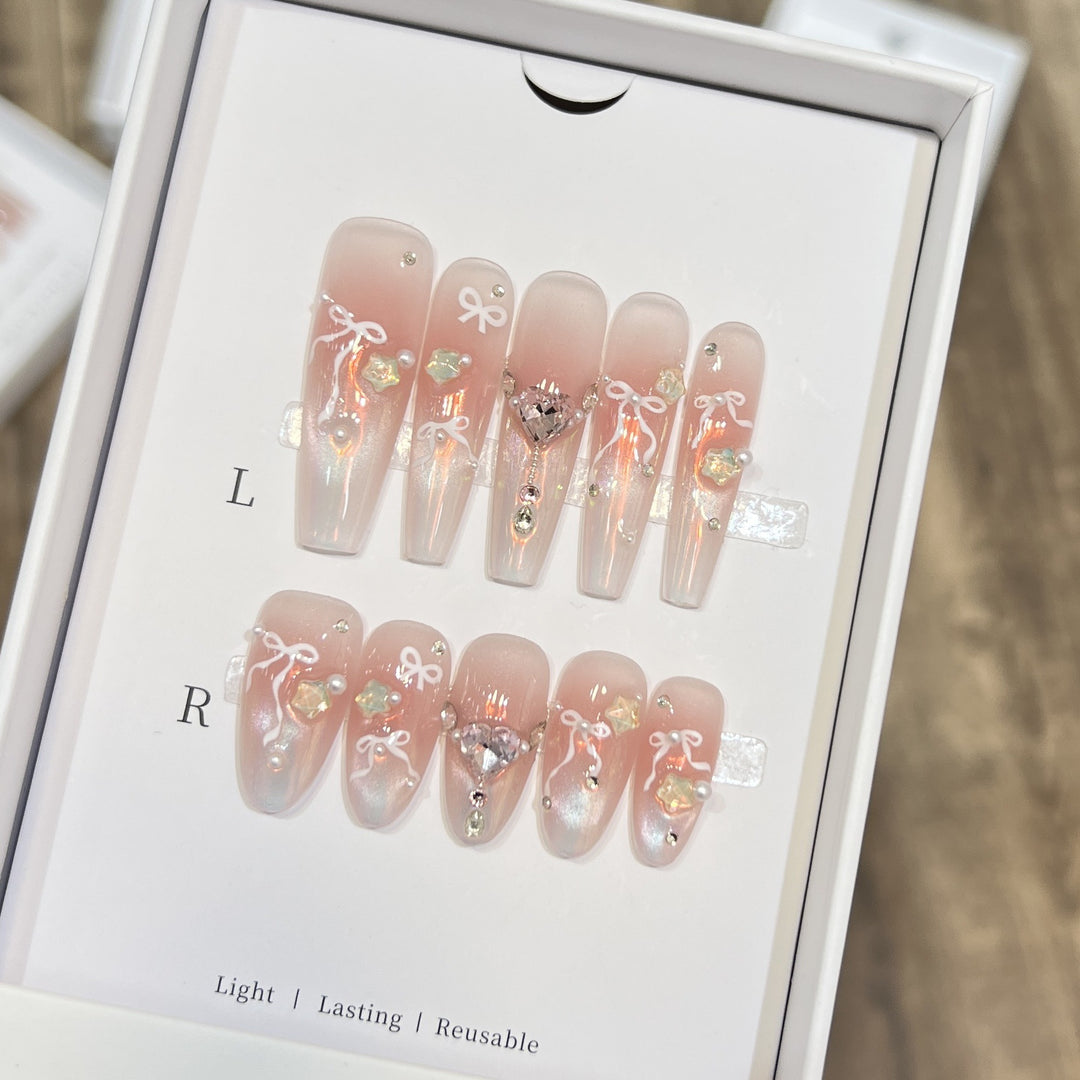 Elegant Press-On Nail Art Set with Chic Ribbon and Gem Accents Bowlift