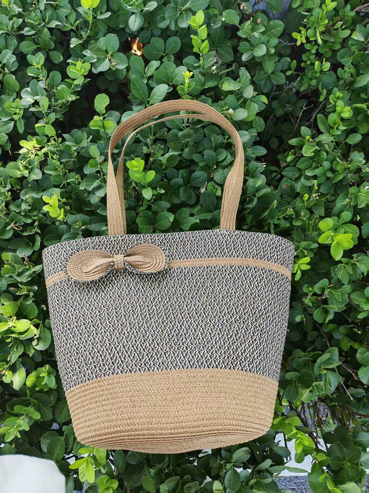 Elegant sun hat with wide brim and subtle stripe pattern Bowlift
