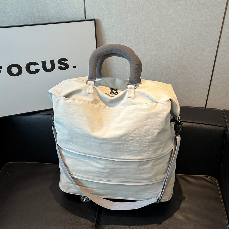 Sporty tote bag with multiple compartments Bowlift