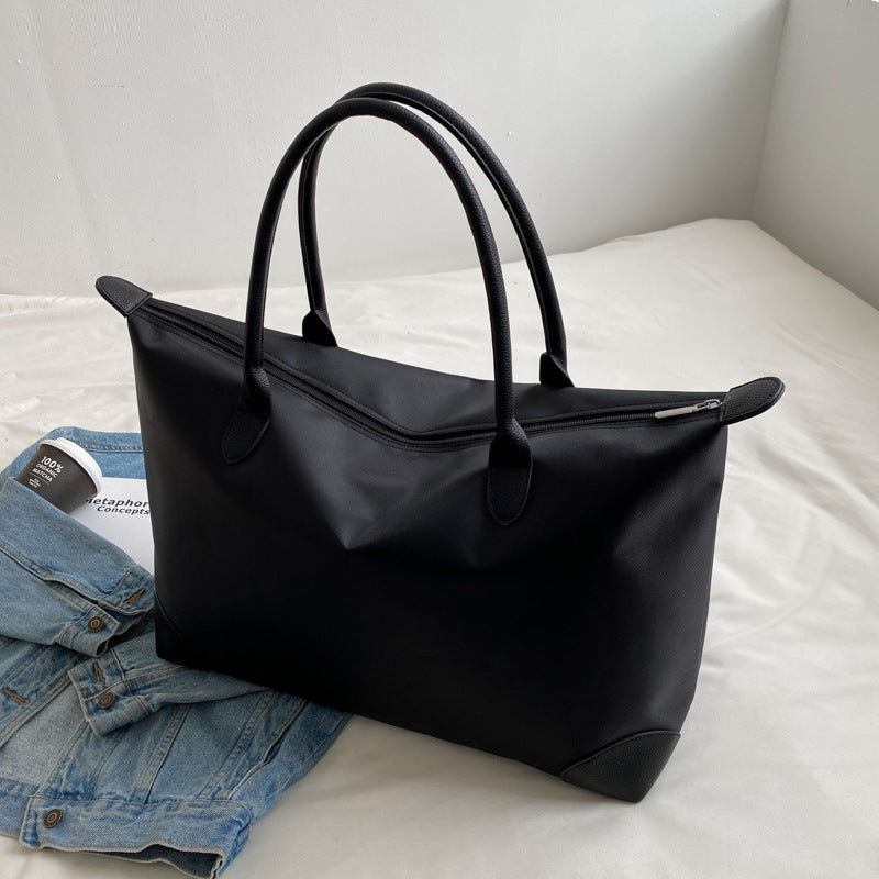 Large travel bag with durable material and multiple compartments Bowlift