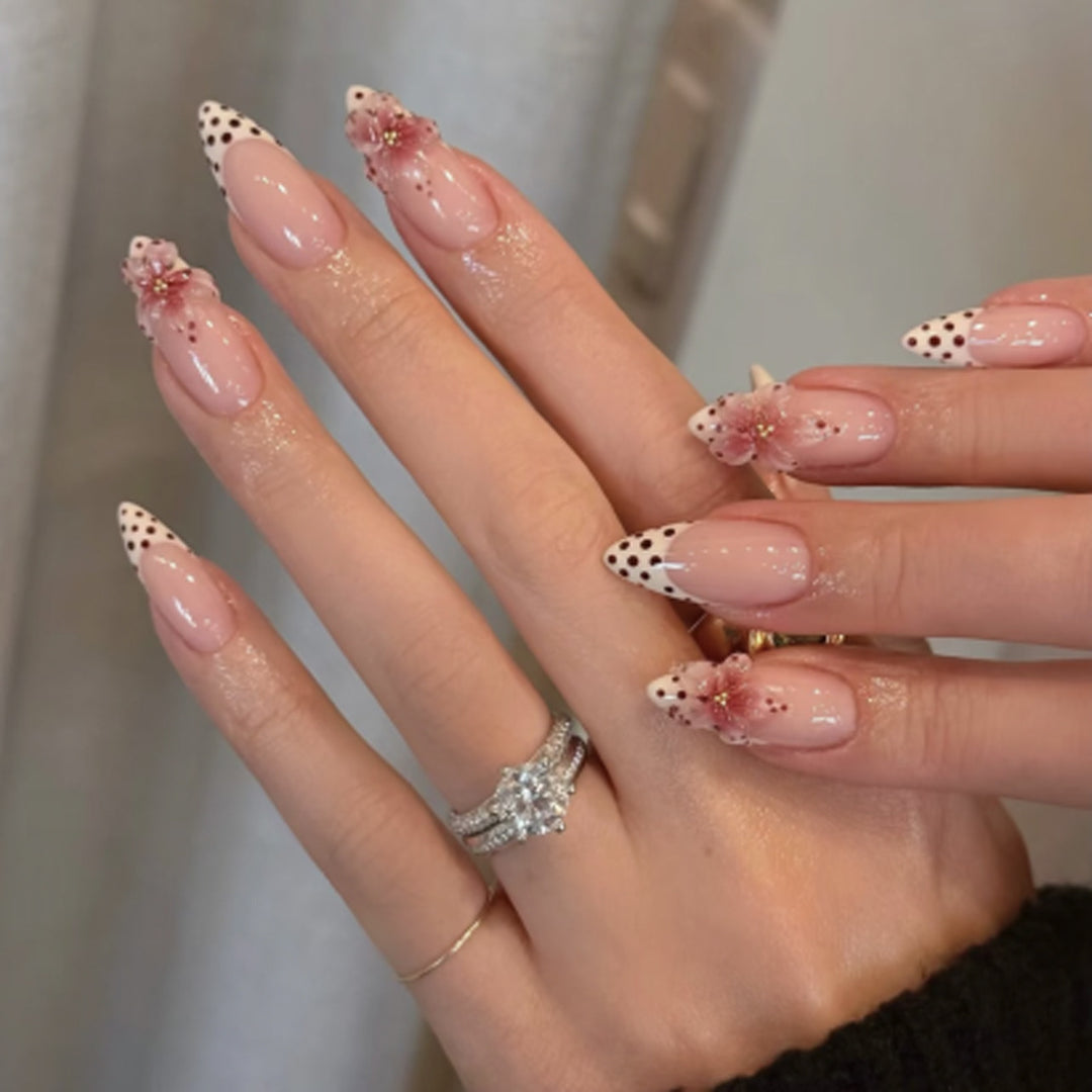 Artificial nail art with floral accents Bowlift