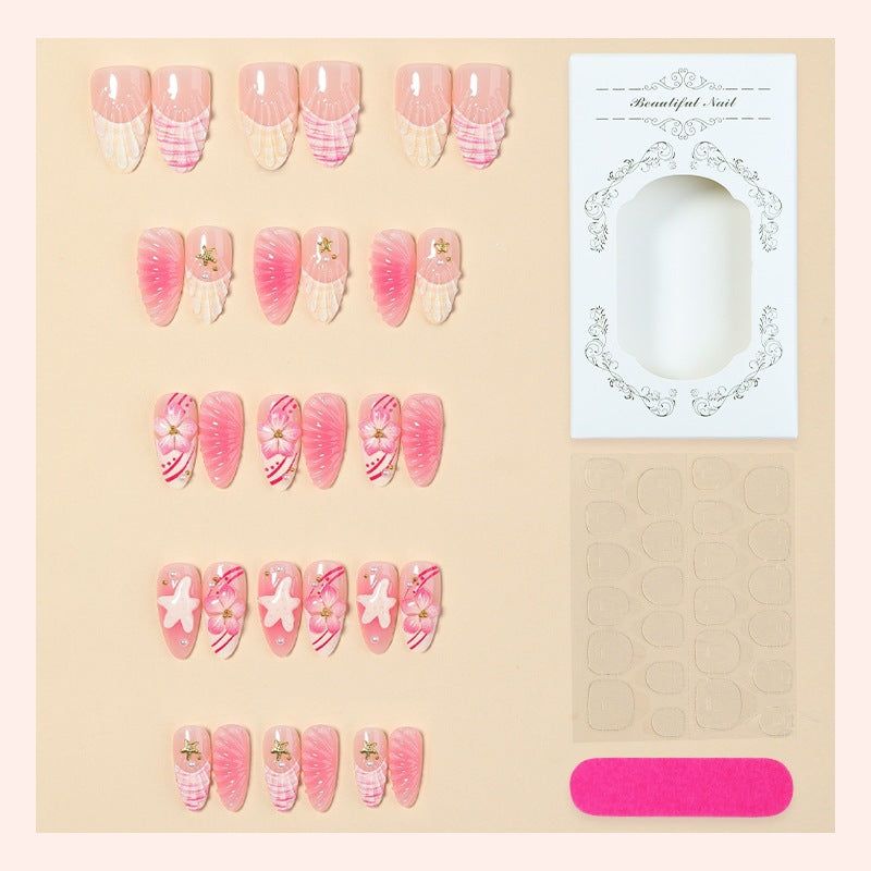 Artificial nail set with maritime motifs and glamorous accents Bowlift