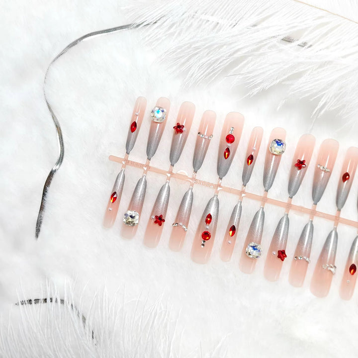 Artificial nails with glamorous design and sparkling accents Bowlift