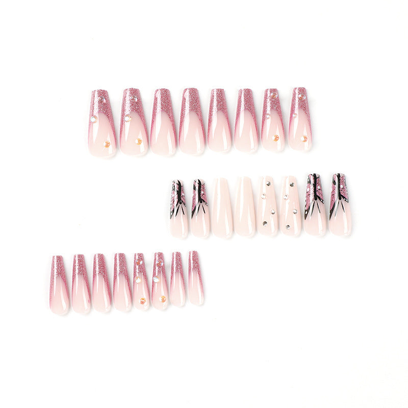 Artful stiletto nails with floral and glittering accents Bowlift