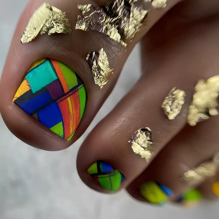 Creative toenail design with modern geometric patterns and golden accents Bowlift