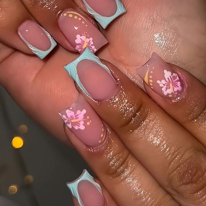 Artificial nail set with floral motifs and shiny accents Bowlift