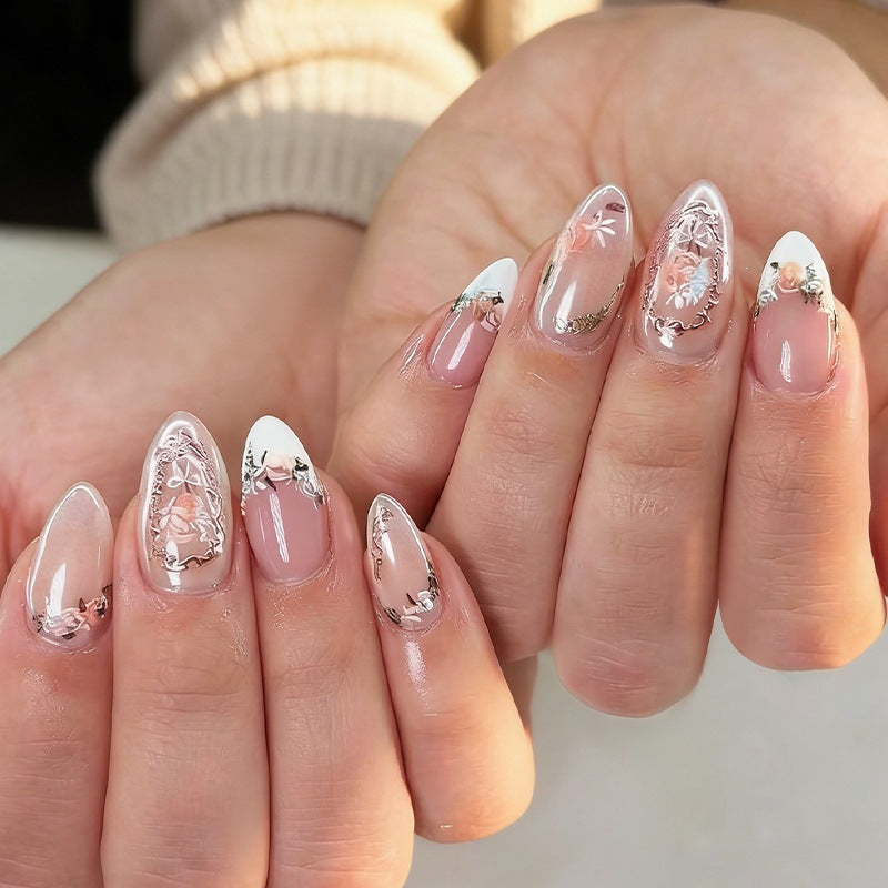 Acrylic nail set with elegant floral and glitter motifs Bowlift
