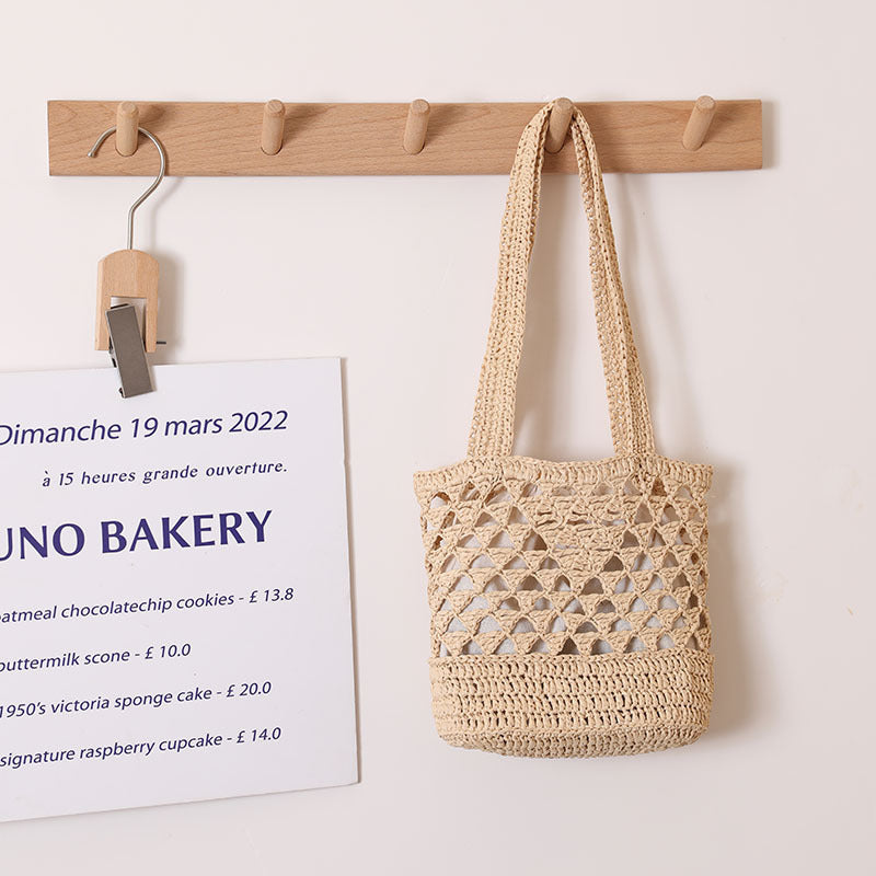 Handcrafted net straw bag with elegant straps Bowlift