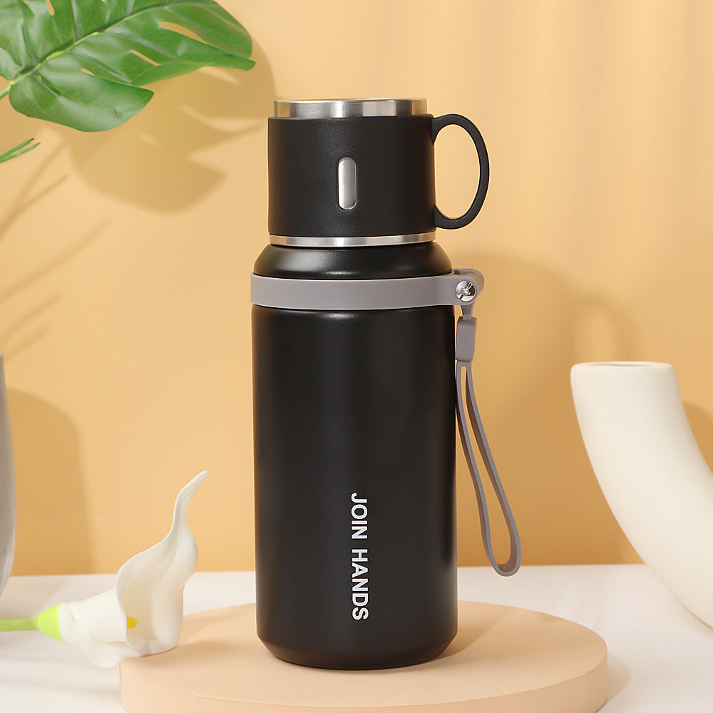 Women's insulated stainless steel drinking bottle with foldable cup Bowlift