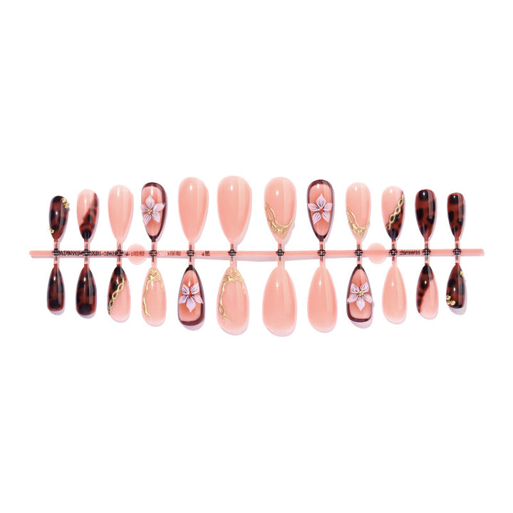 Artistic Press-On Nail Set with Elegant Floral and Abstract Designs Bowlift