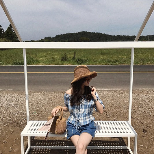 Handcrafted rattan bag with refined details Bowlift