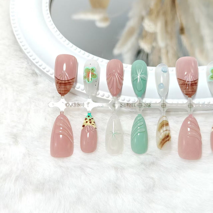 Artificial nail set with exquisite floral designs and shimmering effects Bowlift
