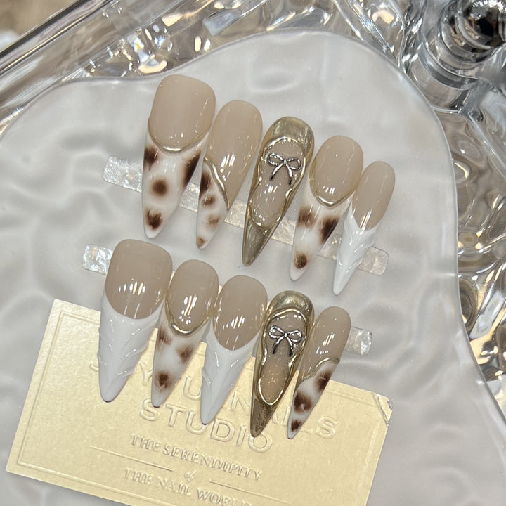 Decorative Stiletto Press-On Nail Art Set with Unique Design Elements Bowlift