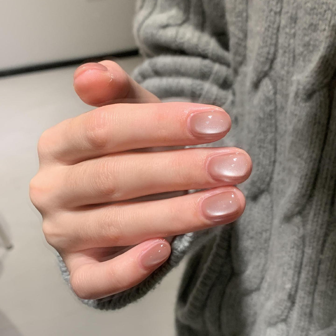 Artificial nails in modern ombre design Bowlift