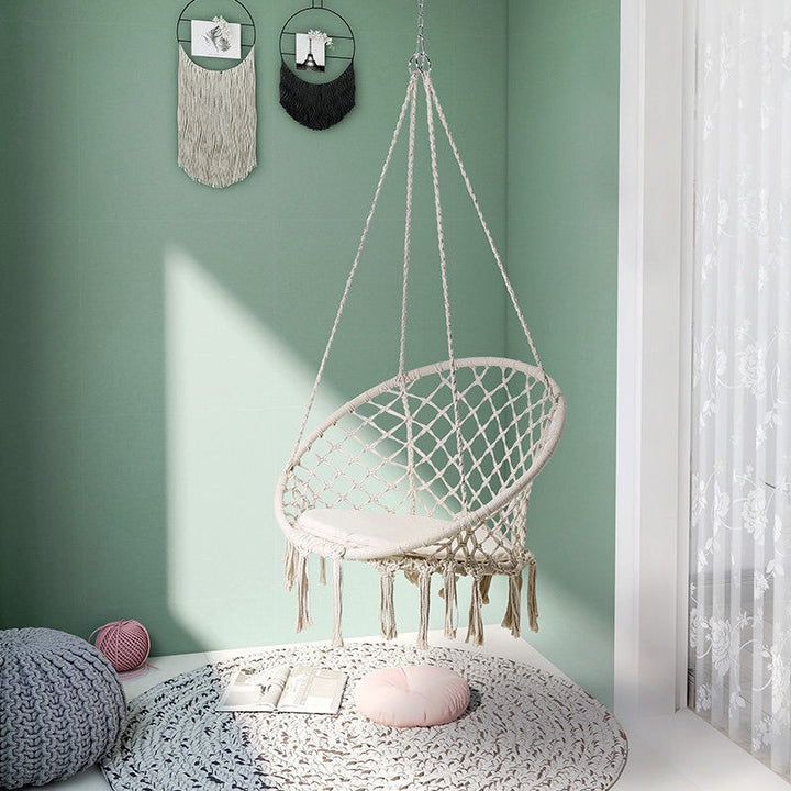 Boho macrame hanging swing chair with faux fur cushion and fringe Bowlift