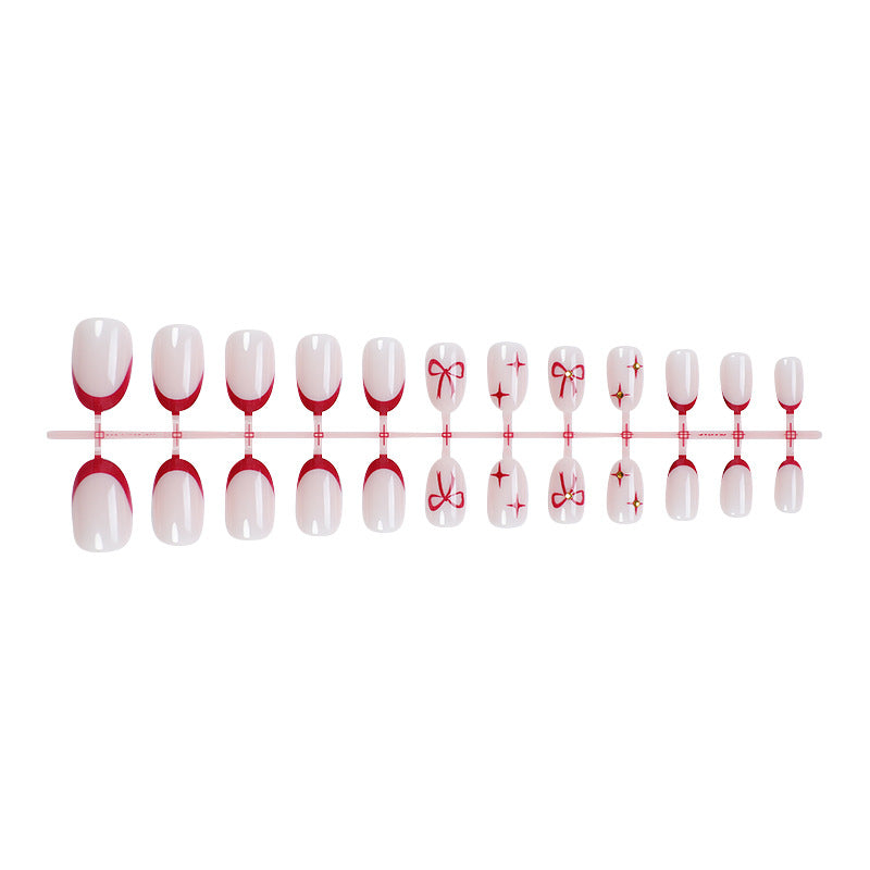 Acrylic nail set with elegant arch design and glitter effects Bowlift