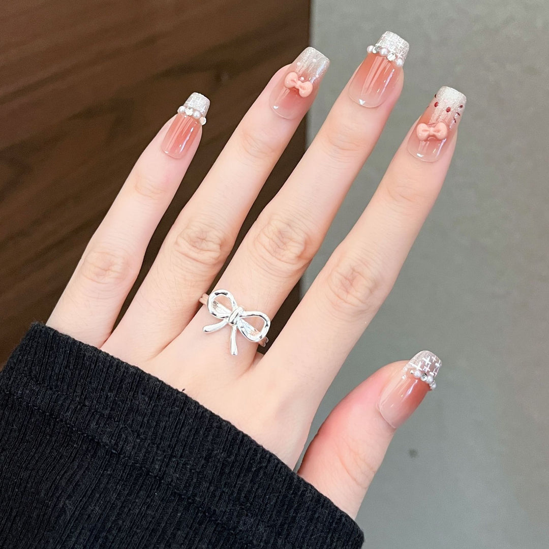 Artistic Nail Design with Decorative Elements Bowlift
