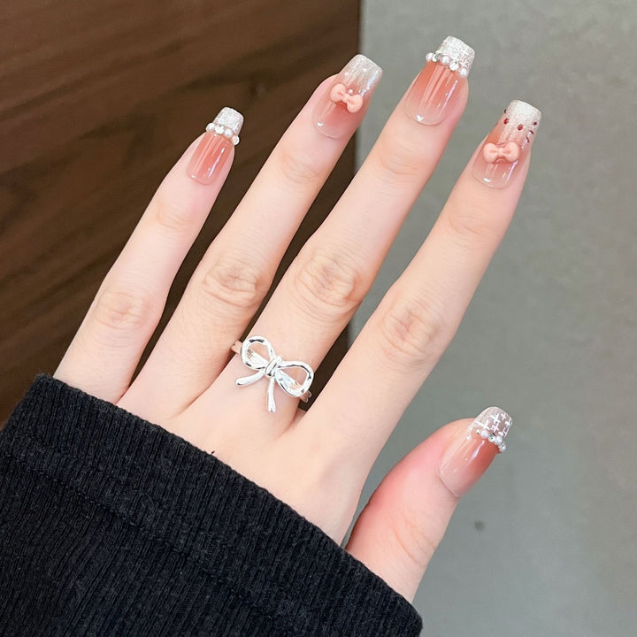 Artistic Nail Art Extensions with Floral Accents Bowlift