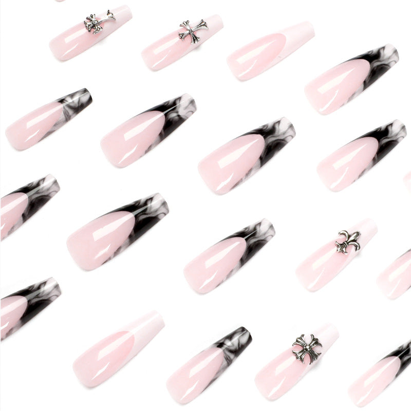 Exquisite artificial nails with textured designs and jewelry accents Bowlift