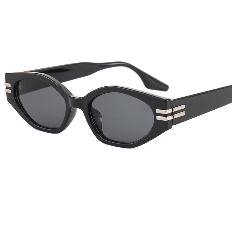 Women striking vintage sunglasses with asymmetric frame Bowlift