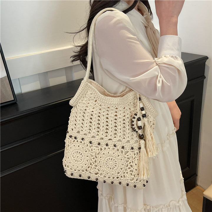 Hand-knotted shoulder bag with playful fringe design Bowlift