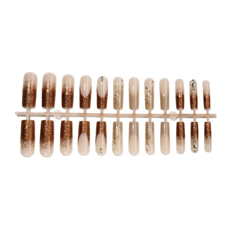Glamorous artificial nail set with glitter and elegant embellishments Bowlift