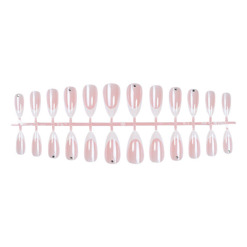 Artificial nail set with elegant French tips and glitter accents Bowlift