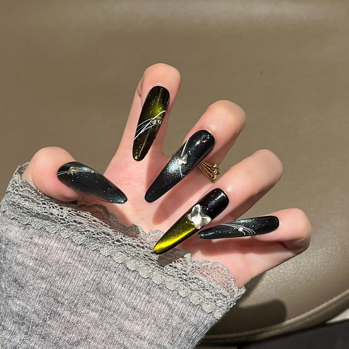Artistic Stiletto Press-On Nail Art with Glimmering Accents Bowlift
