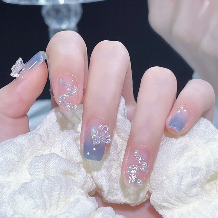 Press-On Nail Design Set with Artistic Holographic Elements Bowlift