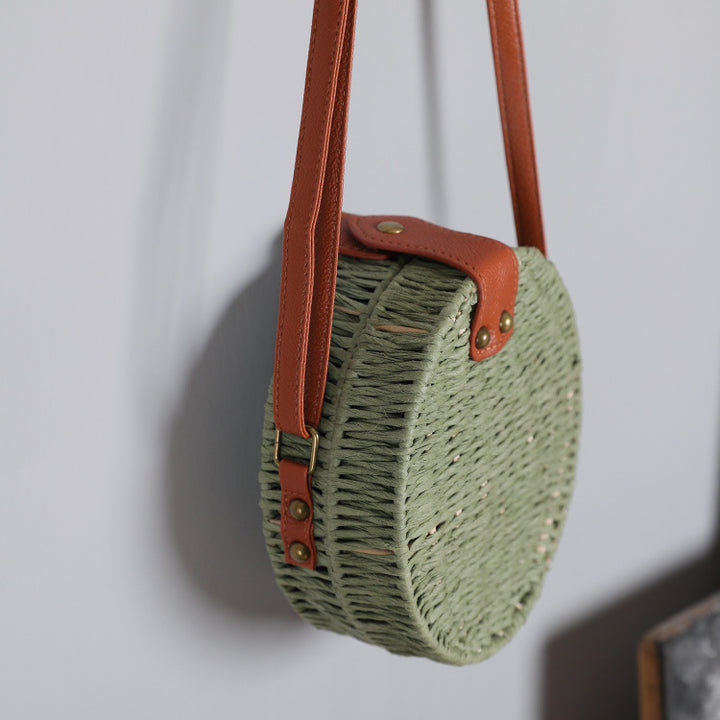 Round basket bag with leather accents Bowlift