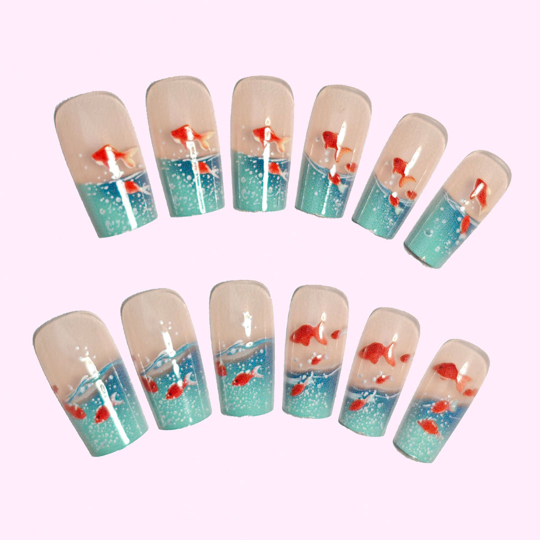 Artifical nails with maritime goldfish design Bowlift