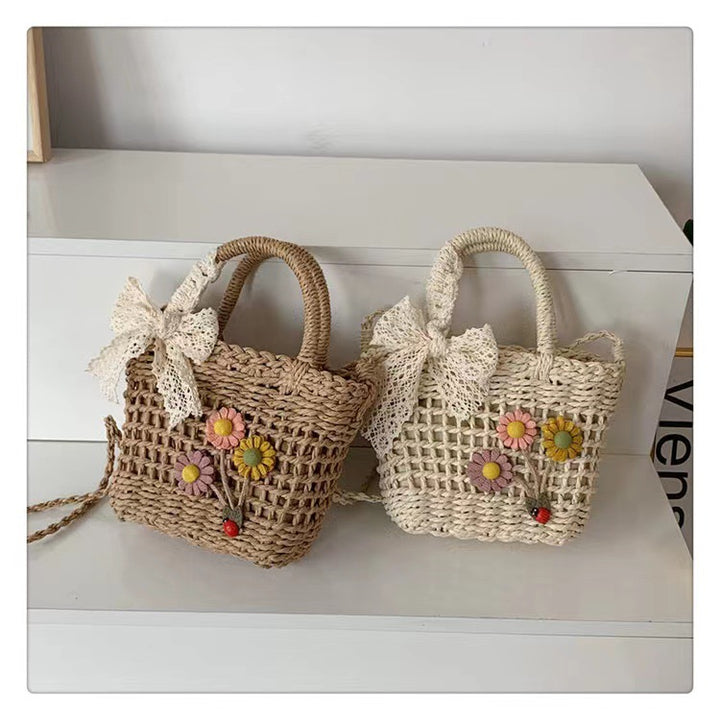 Playful basket bag with floral appliqués Bowlift