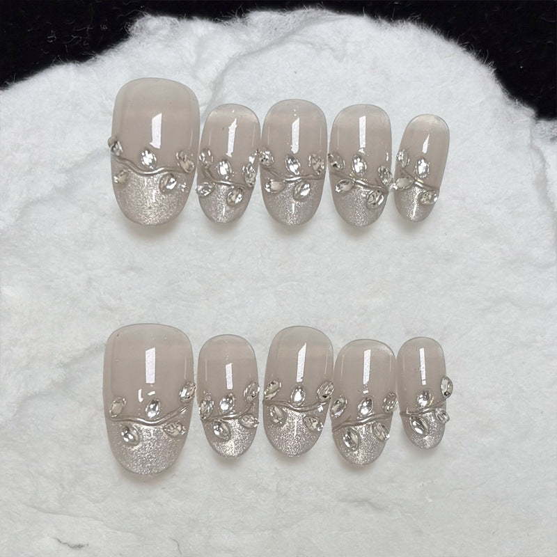 Elegant Press-On Nail Set with Decorative Rhinestone Accents Bowlift