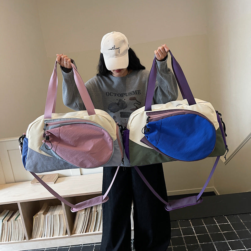 Versatile Multi-Pocket Fitness Duffel Bowlift