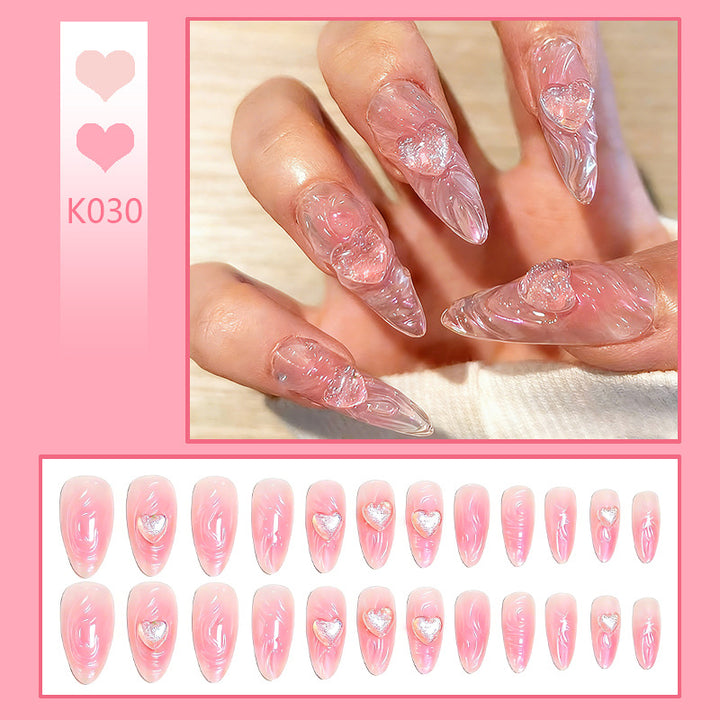 Artificial nail set with 3D heart decorations and shimmering accents Bowlift