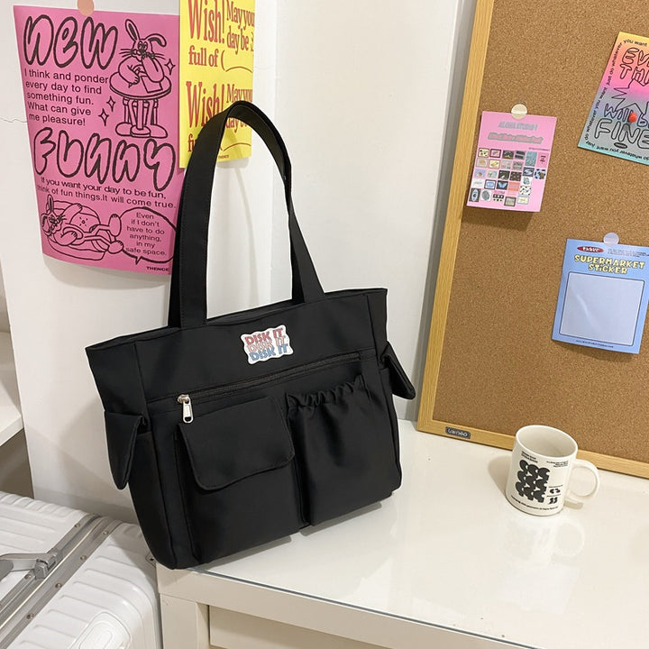 Tote bag with versatile compartments and ergonomic design Bowlift