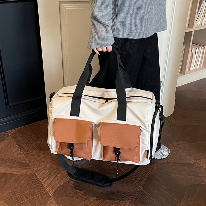 Multifunctional tote bag with comfortable shoulder padding and numerous outer pockets Bowlift