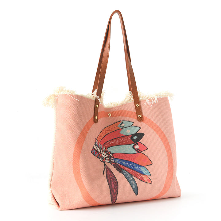 Beach bag with floral pattern and fringes Bowlift