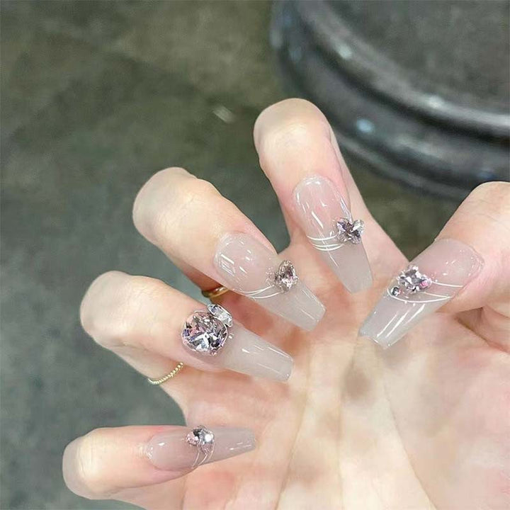 Art nail set with filigree decorations and glamorous accents Bowlift