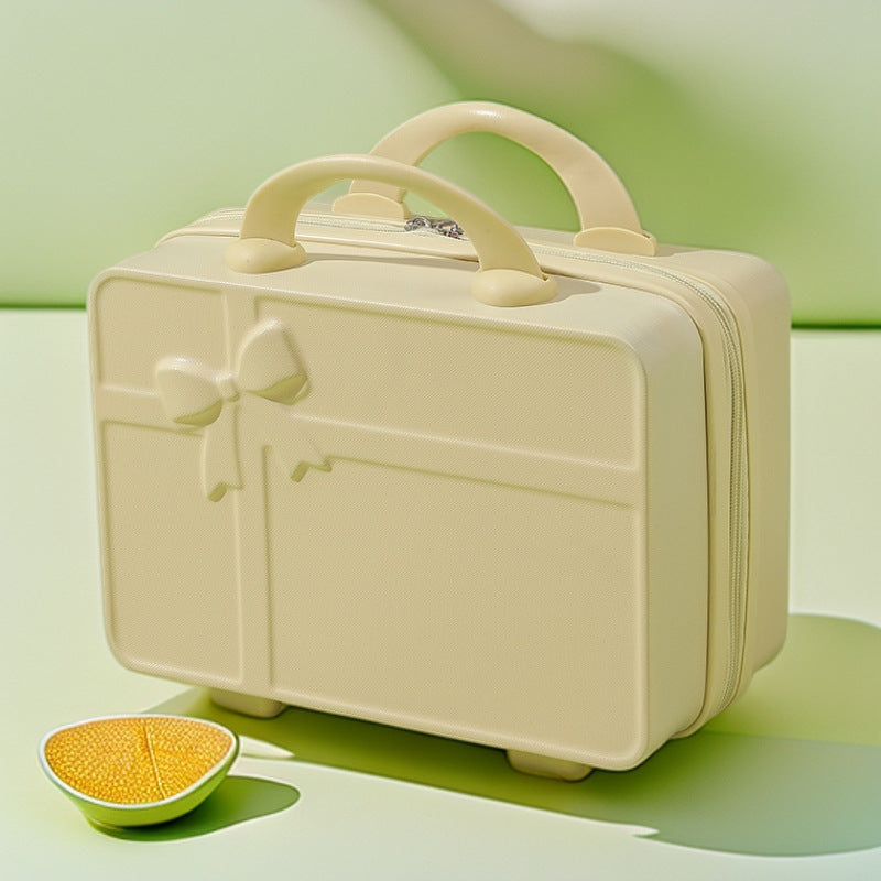 structured hard-shell cosmetic travel case with embossed bow and dual top handles Bowlift