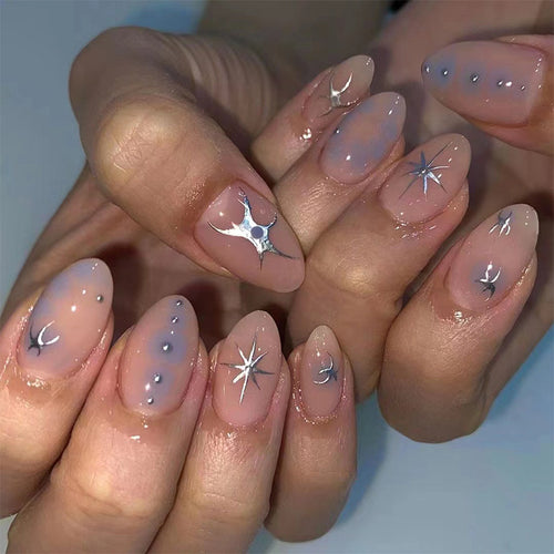 Elegant nail art with glamorous metal embellishments Bowlift
