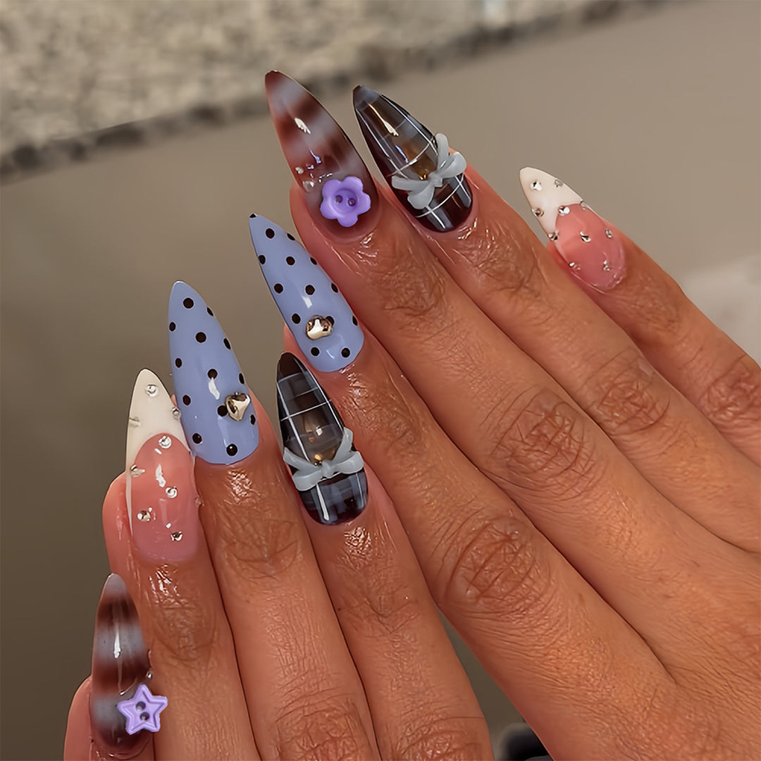 Artificial nails with creative 3D design and playful accents Bowlift
