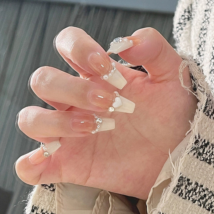 Artificial nail set with elegant flower and glitter decorations Bowlift