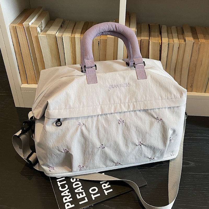 Embroidered Utility Travel Bag